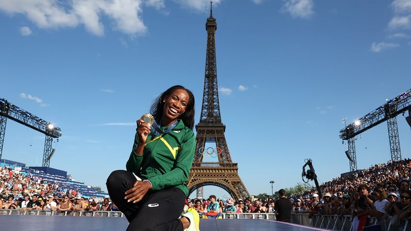 Thea LaFodn in front of Eiffel tower