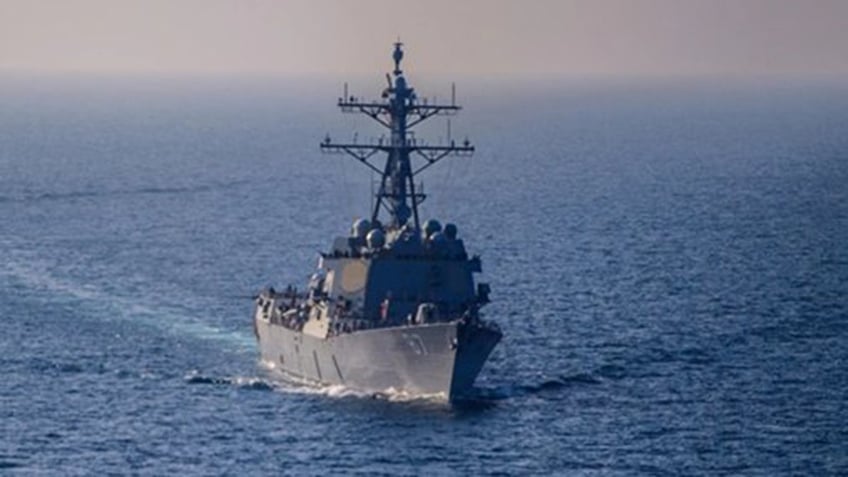 The USS Mason on the water