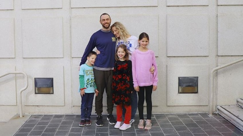 Imahes of Lt. Ridge Alkonis with his family