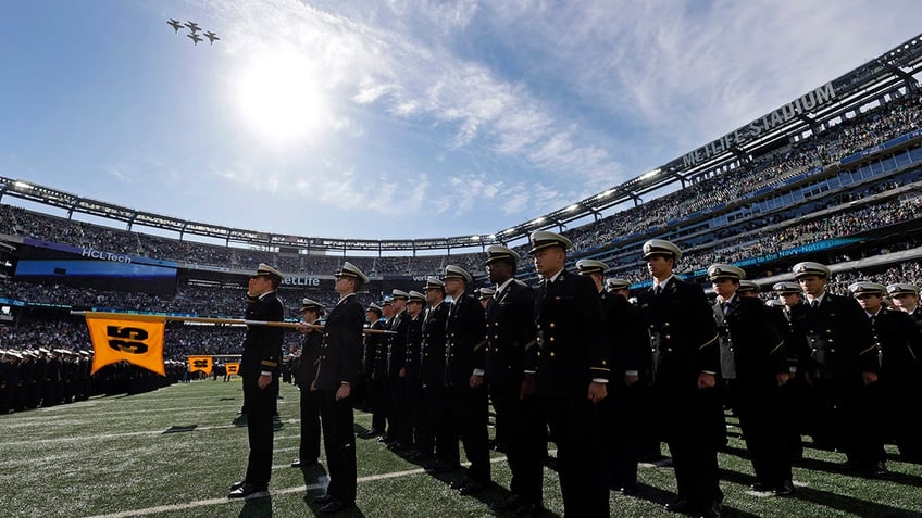 Navy officers line up