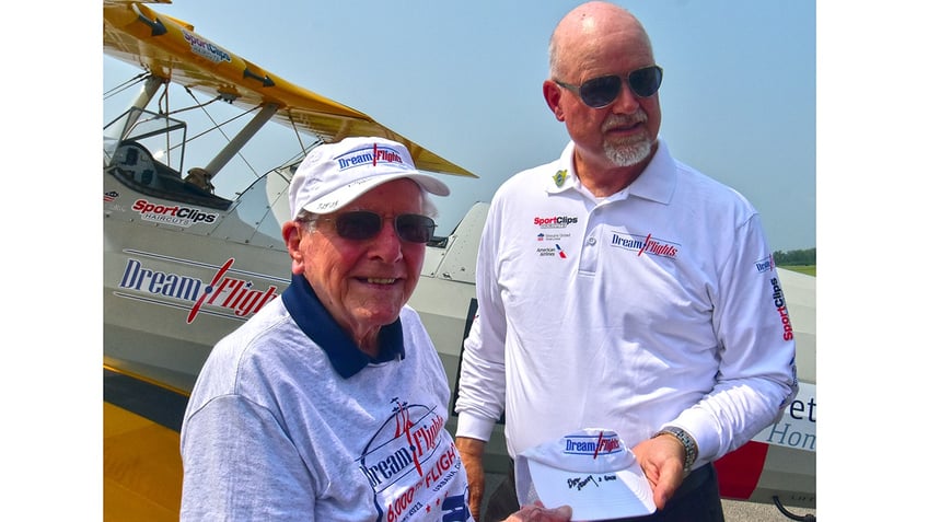 navy veteran airman age 100 flies again on vintage world war ii pilot training biplane