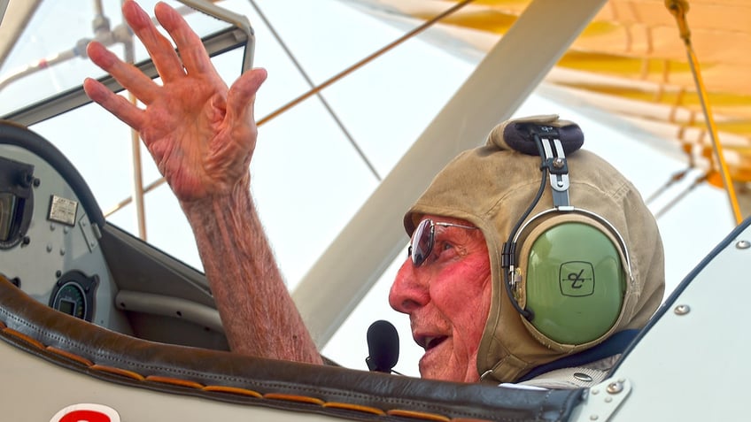 navy veteran airman age 100 flies again on vintage world war ii pilot training biplane