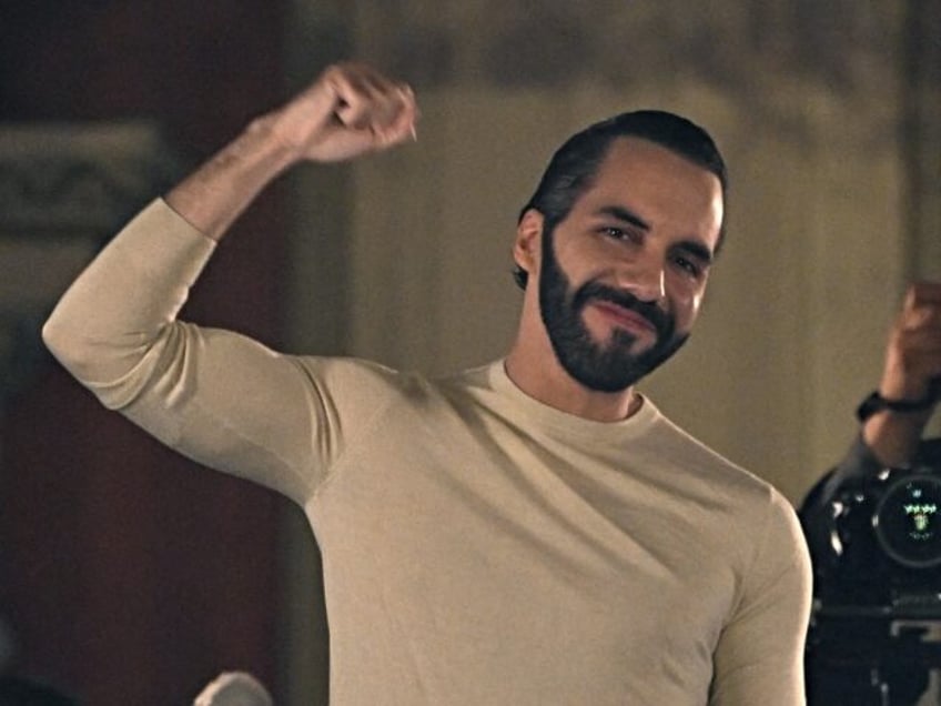 Salvadoran President Nayib Bukele greets supporters next to his wife Gabriela Rodriguez after the presidential and legislative elections in San Salvador on February 4, 2024. Fireworks erupted in El Salvador's capital as gang-busting President Nayib Bukele claimed to have won reelection with more than 85 percent of votes cast: "a …