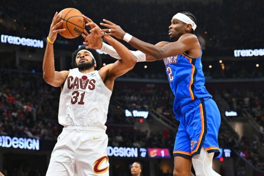 Cleveland's Jarrett Allen, grabbing a rebound over Oklahoma City's Shai Gilgeous-Alexander