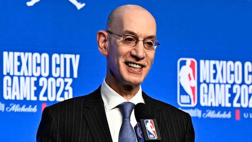 Adam Silver smiles