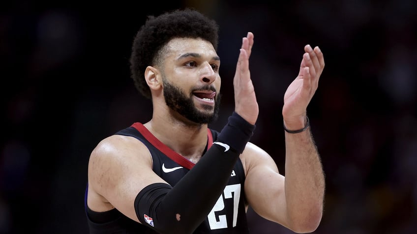Jamal Murray claps