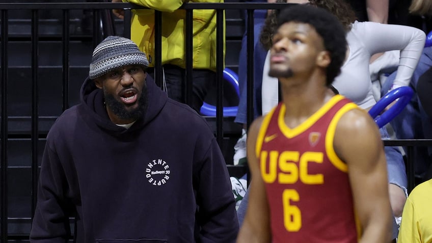 LeBron James yells to Bronny James on court