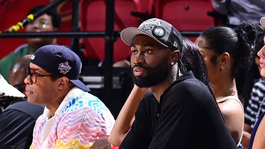 Jaylen Brown looks on during a game