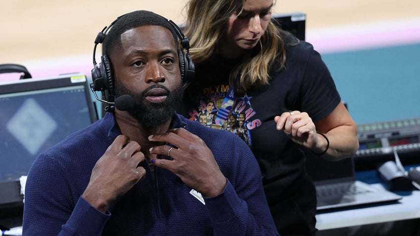 Dwyane Wade gets ready for the call