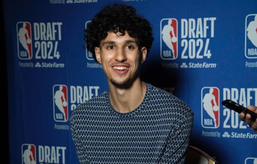 France's Zaccharie Risacher, the top overall pick in the NBA draft, has inked his rookie c