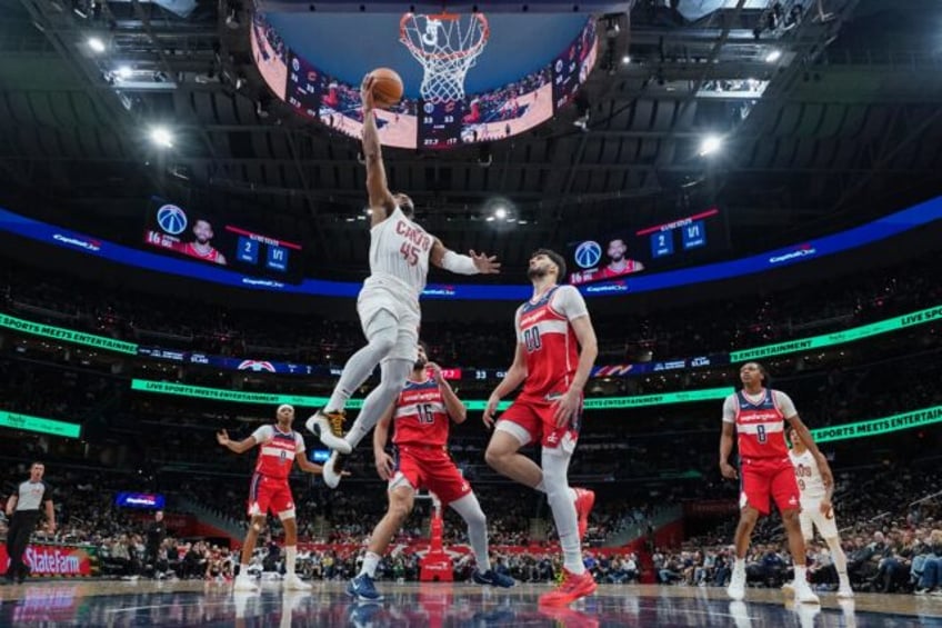 Cleveland star Donovan Mitchell leaps for the basket on his way to a 33-point haul in the