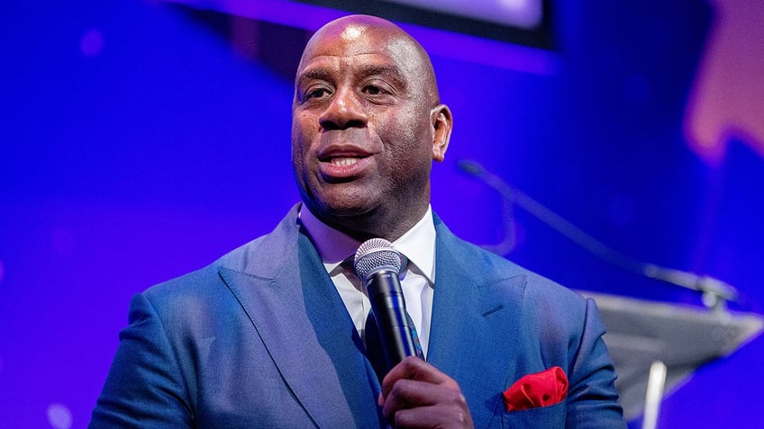 Magic Johnson speaks on stage