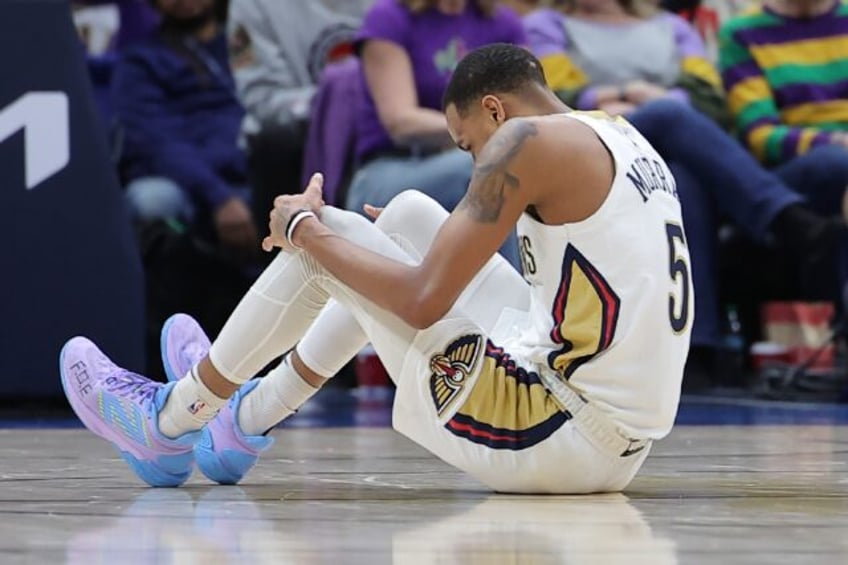 Dejounte Murray of the New Orleans Pelicans suffered a season-ending torn right Achilles t