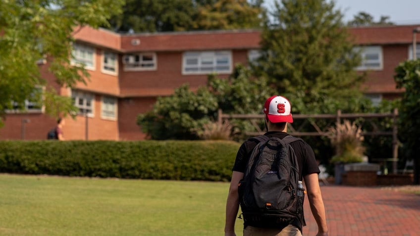 A student on campus at North Carolina State University in Raleigh, North Carolina, U.S., on Monday, Sept. 13, 2021