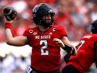 NC State quarterback Grayson McCall carted off the field after scary hit sends helmet flying