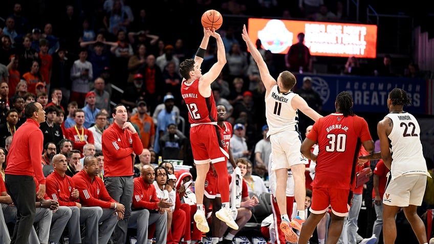 Michael O'Connell shoots a three-pointer