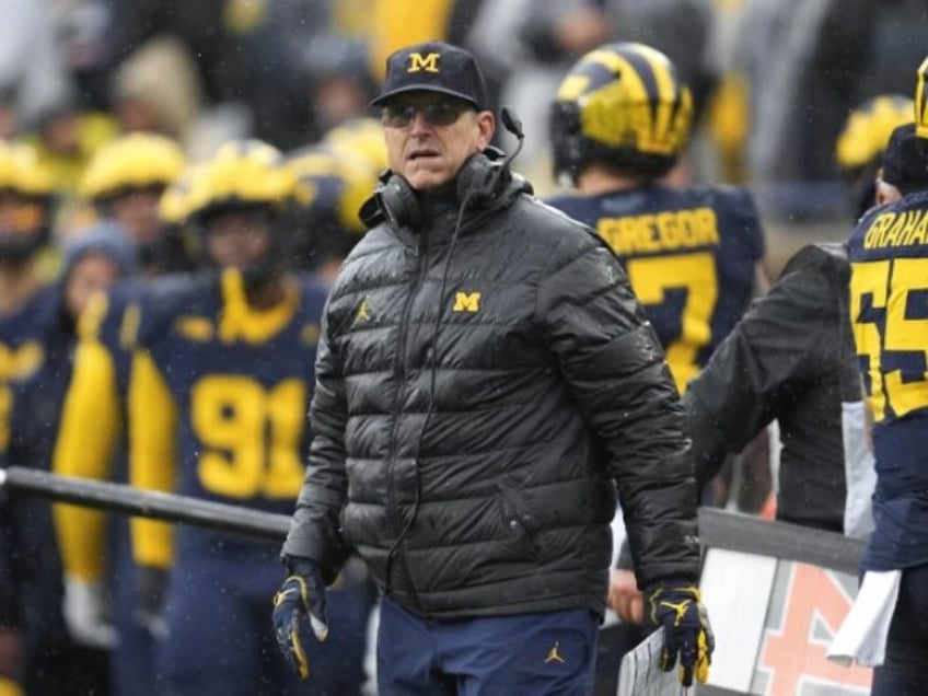 ncaa investigating allegations of sign stealing by no 2 michigan school says it is cooperating