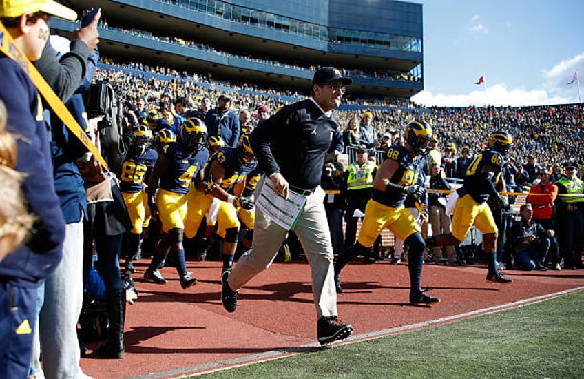 ncaa investigating allegations of sign stealing by no 2 michigan school says it is cooperating