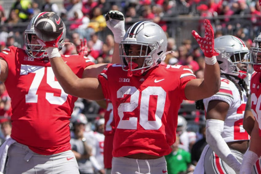 Ohio State Buckeyes running back James Peoples celebrates a touchdown during the Ohio State Spring Game at Ohio Stadium in Columbus, Ohio on April...