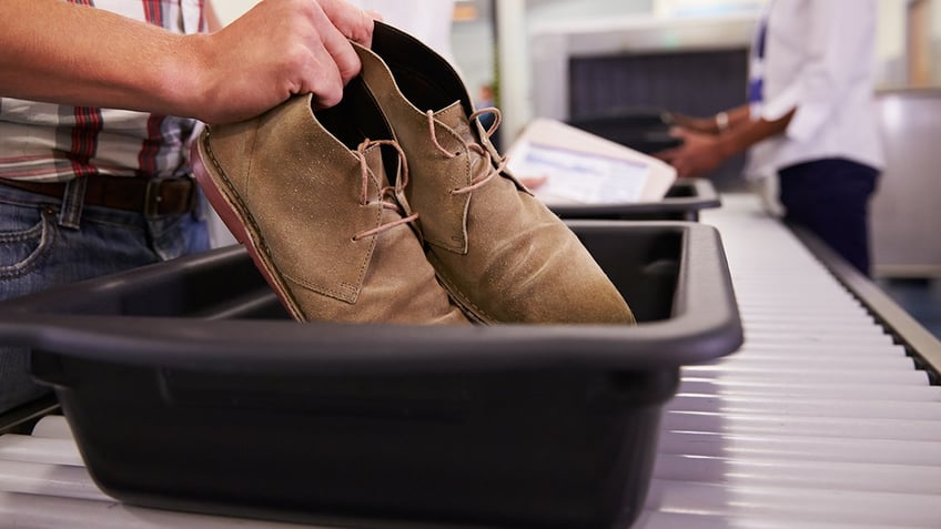 shoes off airport