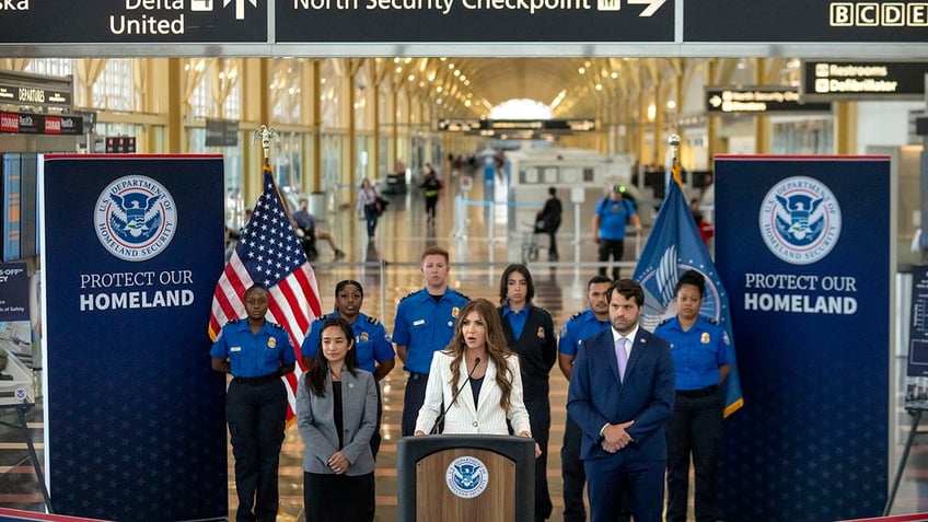 Homeland Security Secretary Kristi Noem speaks during a news conference where she announced that most airline passengers will no longer have to remove their shoes at security checkpoints on Tuesday, July 8, 2025, at Reagan National Airport in Washington. (AP Photo/Mark Schiefelbein)