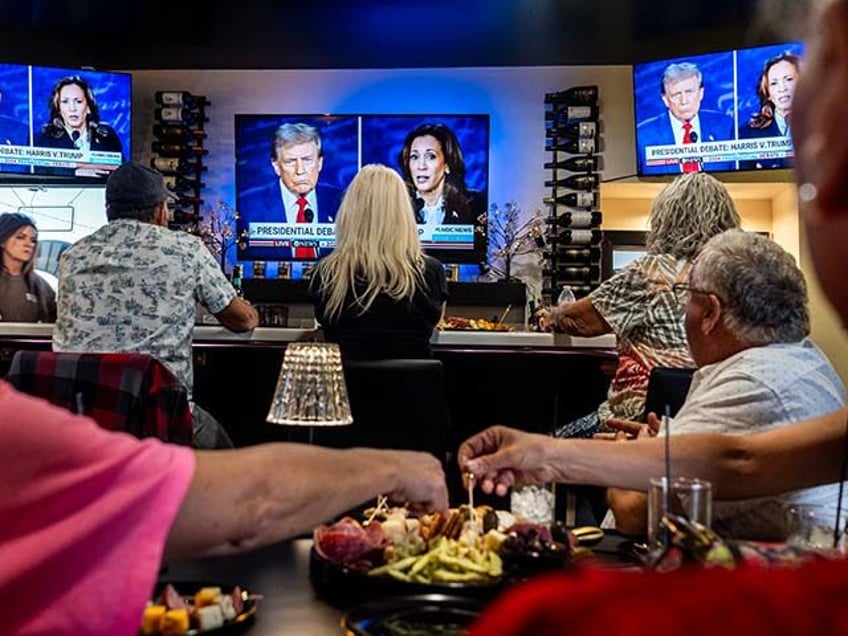 Winnemucca Republicans gather at a wine bar to watch the Presidential debate between Vice