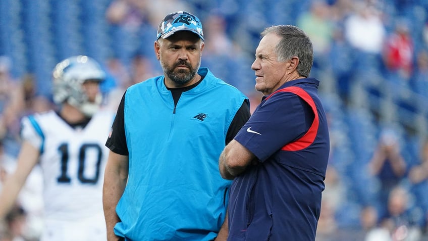  Bill Belichick chats with Matt Rhule