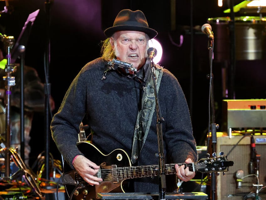 LOS ANGELES, CALIFORNIA - APRIL 26: Neil Young performs onstage during the Light Up The Bl