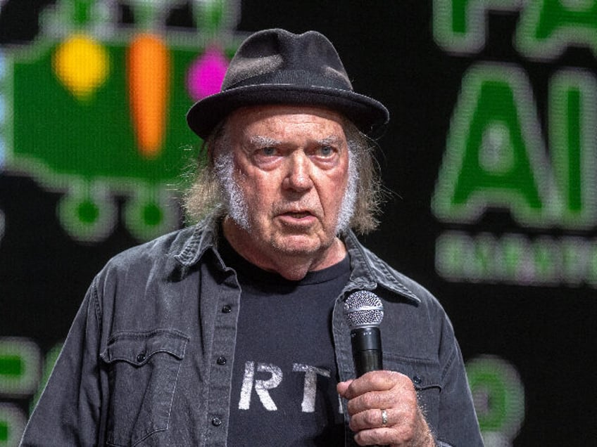 SARATOGA SPRINGS, NEW YORK - SEPTEMBER 21: Neil Young on stage during Farm Aid 2024 at Sar