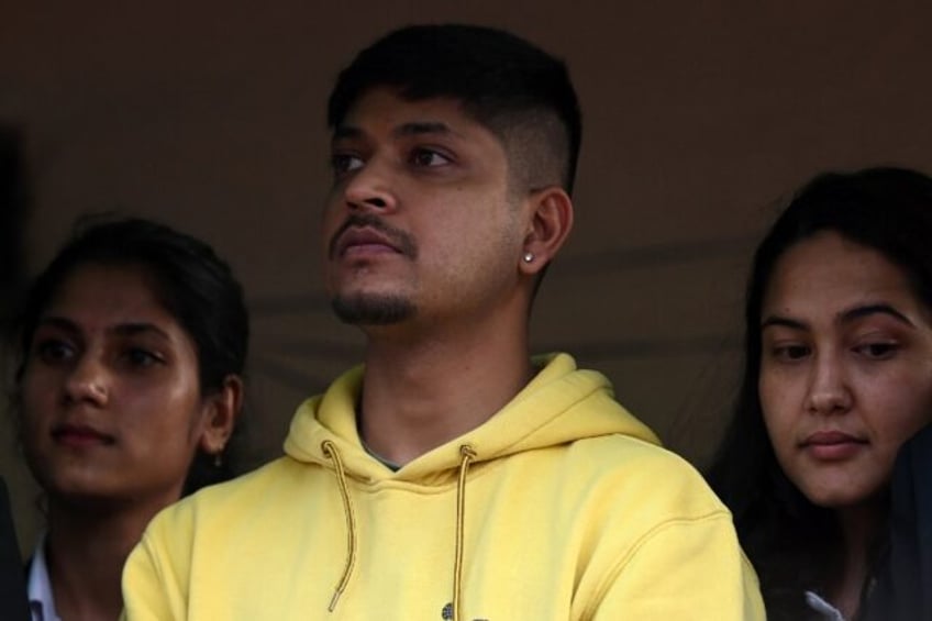 Nepali cricketer Sandeep Lamichhane outside court last month