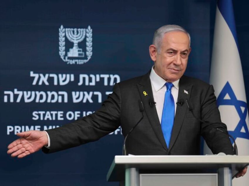 Israeli Prime Minister Benjamin Netanyahu attends a press conference at the Government Pre