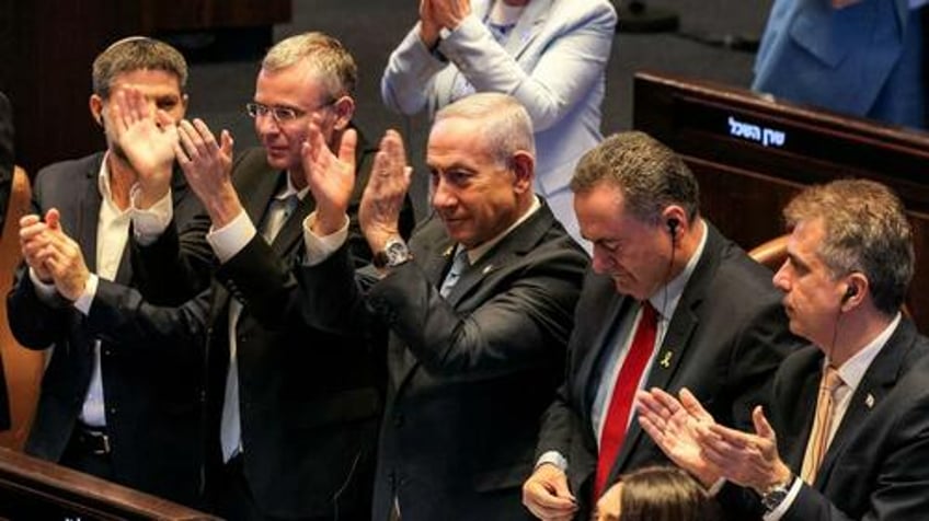 netanyahu survives coalition collapse strikes deal with ultra orthodox partners