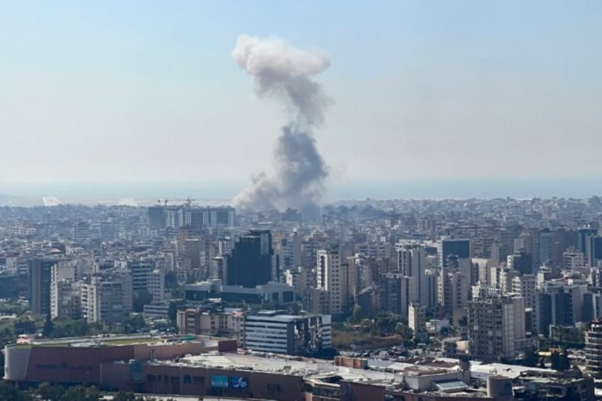 Smoke rises from the site of an Israeli air strike on Beirut's southern suburbs