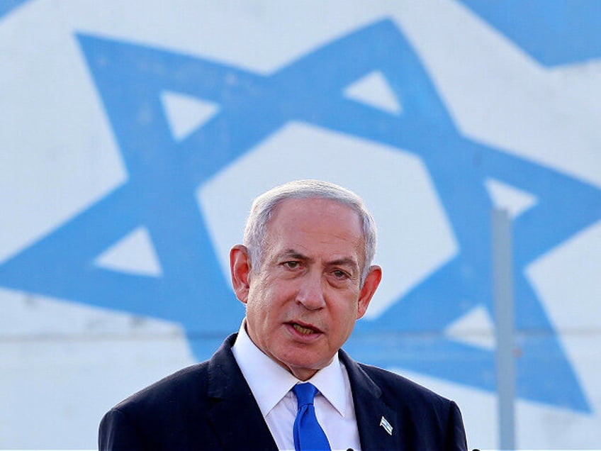 TOPSHOT - Israel's Prime Minister Benjamin Netanyahu delivers a speech during his visit to an Israeli unmanned aerial vehicle (UAV) centre, at the Palmachim Airbase near the city of Rishon LeZion on July 5, 2023. (Photo by JACK GUEZ / AFP) (Photo by JACK GUEZ/AFP via Getty Images)