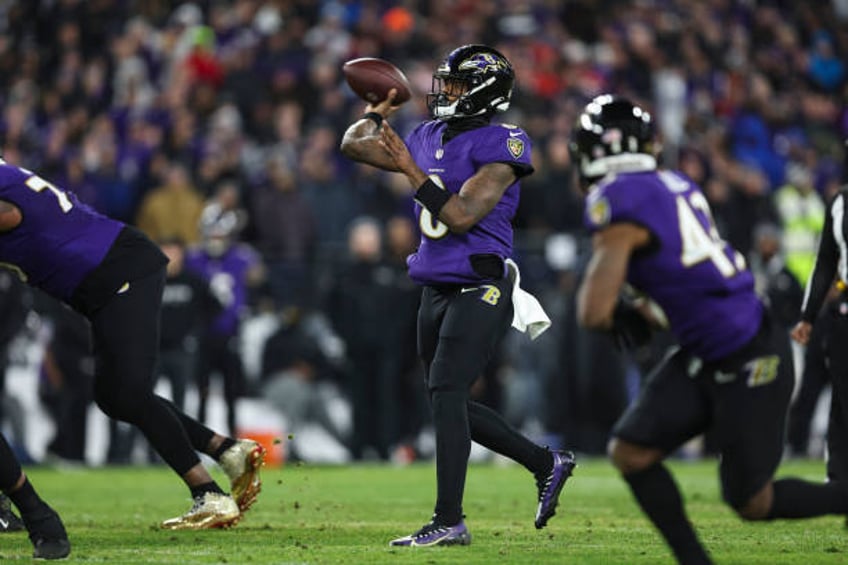 Lamar Jackson of the Baltimore Ravens throws the ball during the AFC Championship NFL football game against the Kansas City Chiefs at M&T Bank...