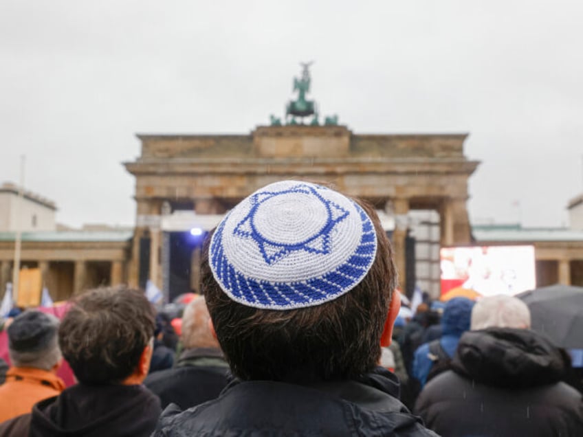 A young man wears a kippah during a demonstration against anti-Semitism on December 10, 2023 at Brandenburger Gate in Berlin. (Photo by MICHELE TANTUSSI / AFP) (Photo by MICHELE TANTUSSI/AFP via Getty Images)