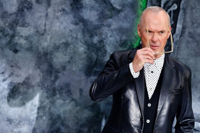 Actor Michael Keaton poses on the red carpet at the London premiere of 'Beetlejuice Beetle