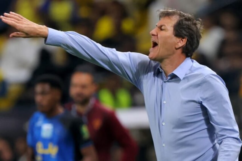 new boss garcia plays down napolis serie a title hopes