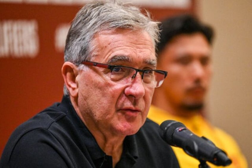 Chian coach Branko Ivankovic speaks to reporters in Singapore