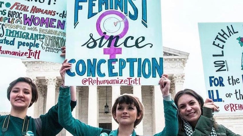 Kay Fellows, a liberal pro-life activist, protests at the Supreme Court. (Photo credit: Maria Oswalt)