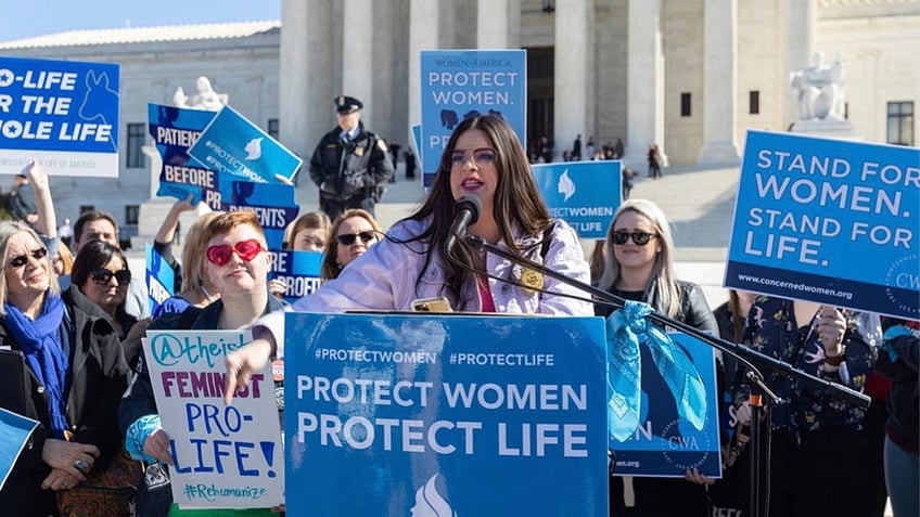 Terrisa Bukovinac speaks in front of the Supreme Court. Photo credit Terrisa Bukovinac.