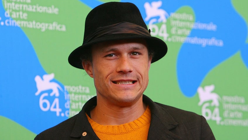 Heath Ledger wears a hat