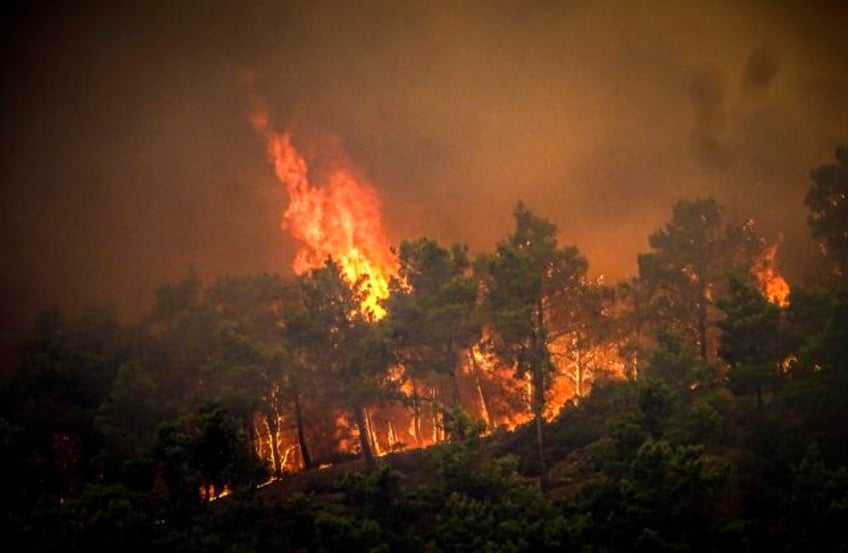 new evacuations ordered in greece as high winds and heat fuel wildfires