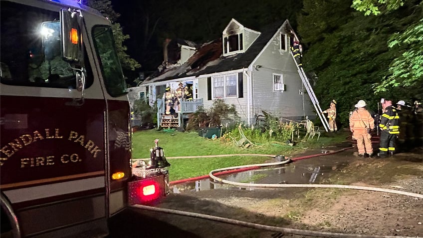 Firefighters respond to a fire to a house in New Jersey