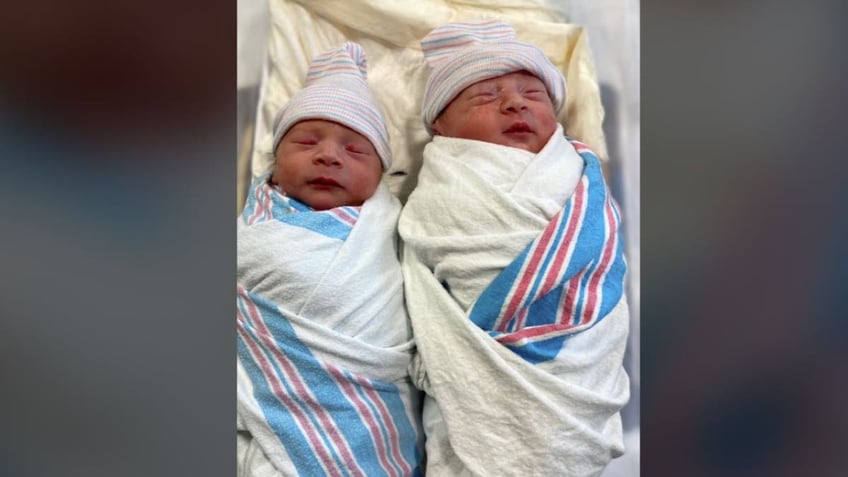 Close-up of newborn twins sleeping