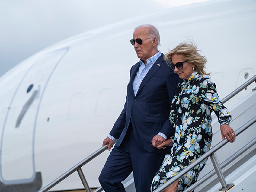 President Joe Biden, left, and first lady Jill Biden arrive at McGuire Air Force Base, Saturday, June 29, 2024, in Burlington County, N.J. (AP Photo/Evan Vucci)