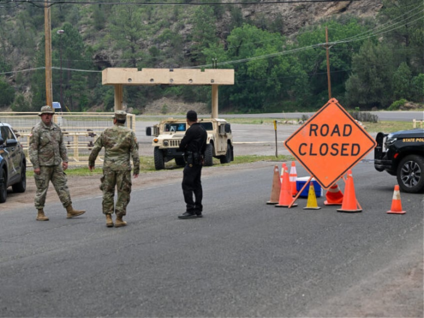 NEW MEXICO, USA - JUNE 20: Security forces are seen as the wildfire of South Fork Fire con