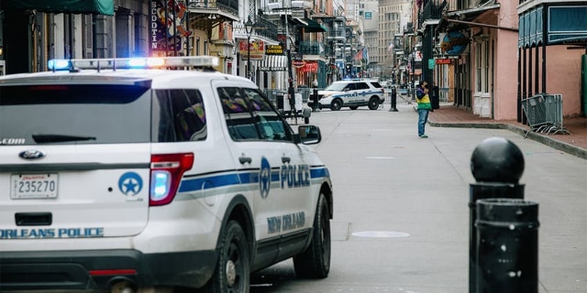 new orleans security guard charged with attempted murder after shooting in front of library