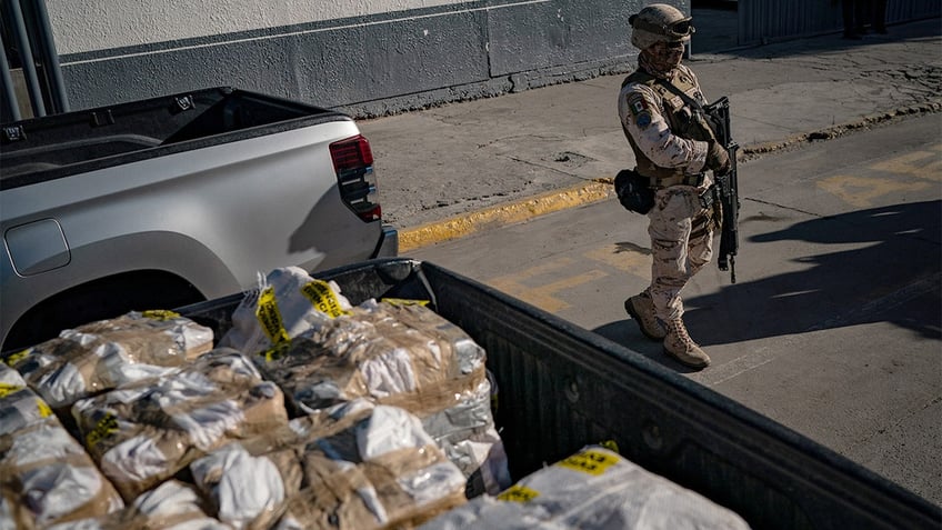 Hundreds of pounds of fentanyl and meth seized near Ensenada in October arrive for officials from Mexico's attorney general's office to be unloaded at their headquarters in Tijuana, Mexico, on Tuesday, Oct. 18, 2022.