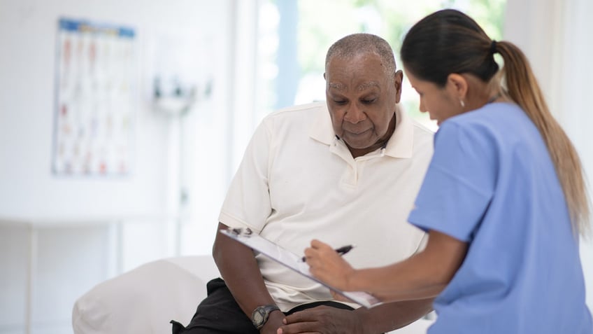 Senior man at doctor